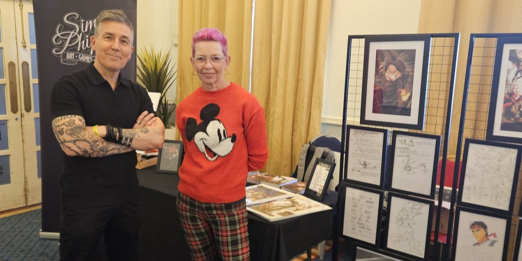 Displaying game design artwork, signing for fans and speaking at Play Expo, Blackpool with my lovely wife, Jayne